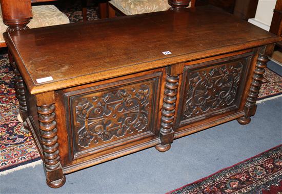 A 17th century style carved oak coffer,  W.115cm